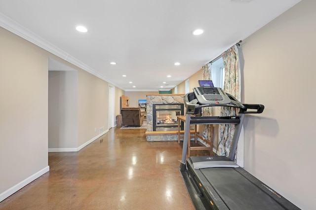 6788 147th St W, Savage, MN 55378 - workout room with recessed lighting, a fireplace, and ornamental molding