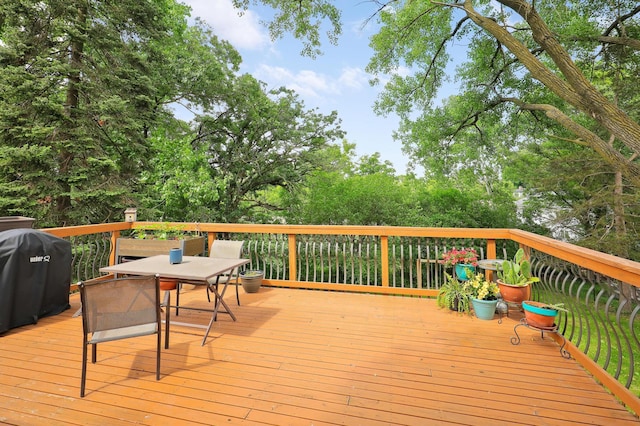 6788 147th St W, Savage, MN 55378 - wooden terrace featuring a grill and outdoor dining space