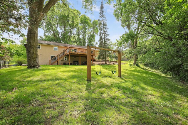 6788 147th St W, Savage, MN 55378 - view of green lawn with a wooden deck and stairway