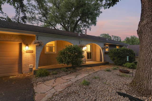 6788 147th St W, Savage, MN 55378 - ranch-style house featuring brick siding and covered porch