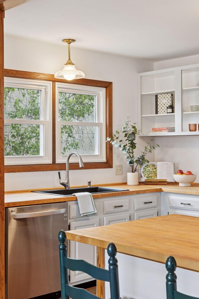 301 3rd St S Unit 302, Stillwater, MN 55082 - kitchen featuring dishwasher, butcher block countertops, white cabinets, pendant lighting, and open shelves