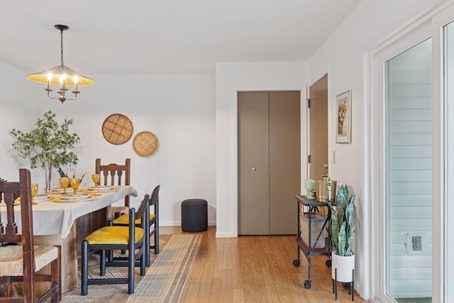 301 3rd St S Unit 302, Stillwater, MN 55082 - dining area featuring light wood-style flooring and baseboards