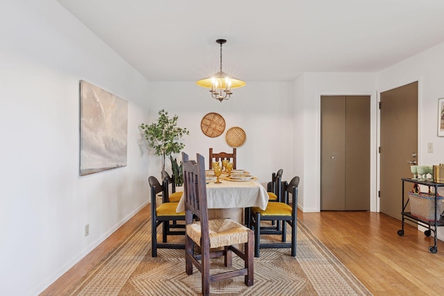 301 3rd St S Unit 302, Stillwater, MN 55082 - dining room with light wood-type flooring and baseboards