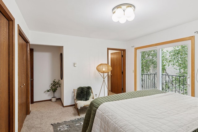 301 3rd St S Unit 302, Stillwater, MN 55082 - carpeted bedroom featuring access to outside and baseboards