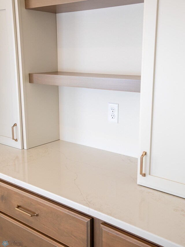 302 Neuman Blvd, Colfax, ND 58018 - detailed view of brown cabinetry