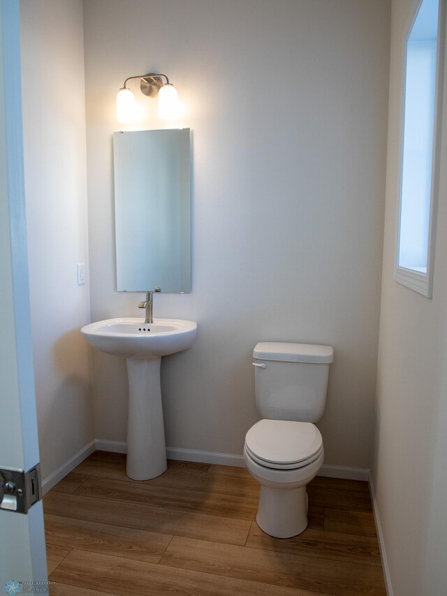302 Neuman Blvd, Colfax, ND 58018 - bathroom with wood finished floors