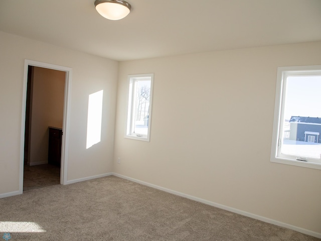 302 Neuman Blvd, Colfax, ND 58018 - carpeted empty room with baseboards