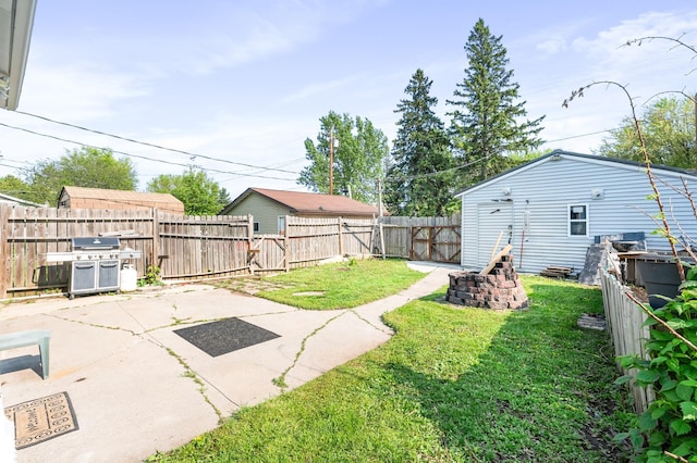 14 3rd St, Proctor, MN 55810 - fenced backyard featuring a patio area