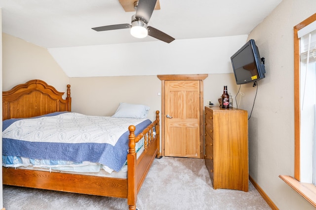 14 3rd St, Proctor, MN 55810 - bedroom with light colored carpet, lofted ceiling, and a ceiling fan