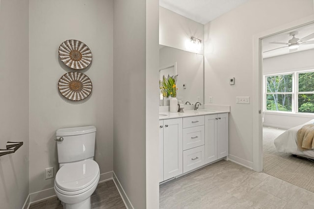 738 Ensconced Way, Chaska, MN 55318 - bathroom with double vanity, a ceiling fan, and connected bathroom
