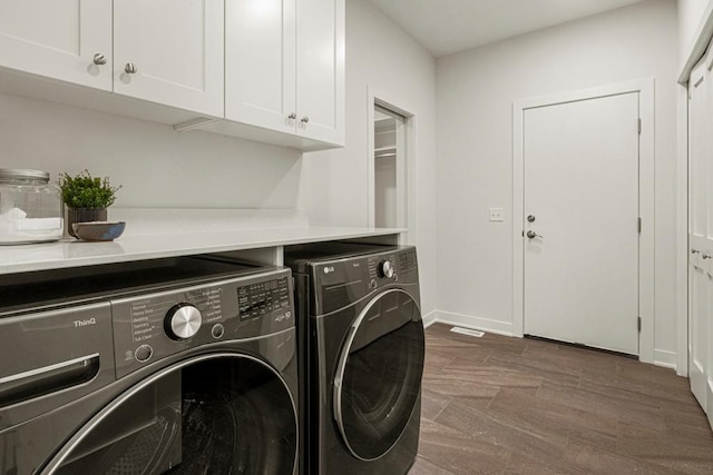 738 Ensconced Way, Chaska, MN 55318 - laundry room with cabinet space and washing machine and clothes dryer