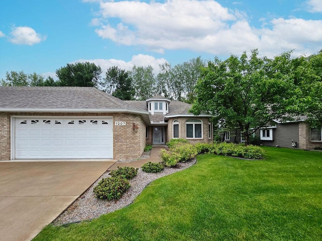 1207 Silverthorn Ct, Shoreview, MN 55126 - view of front of house featuring brick siding, driveway, an attached garage, a front yard, and a shingled roof