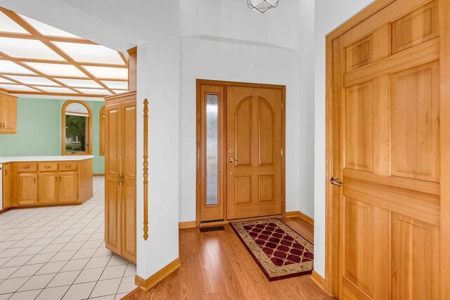 1207 Silverthorn Ct, Shoreview, MN 55126 - foyer featuring baseboards and light wood-style floors