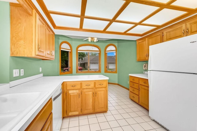 1207 Silverthorn Ct, Shoreview, MN 55126 - kitchen featuring white appliances, light countertops, a ceiling fan, light tile patterned flooring, and a peninsula
