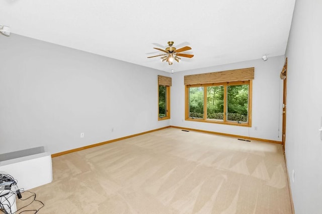1207 Silverthorn Ct, Shoreview, MN 55126 - carpeted empty room featuring baseboards and a ceiling fan