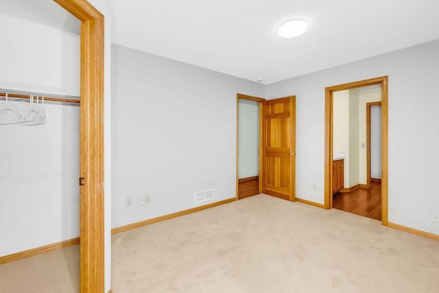 1207 Silverthorn Ct, Shoreview, MN 55126 - unfurnished bedroom featuring carpet and a closet
