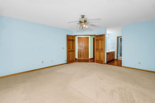 1207 Silverthorn Ct, Shoreview, MN 55126 - unfurnished bedroom with carpet flooring, ensuite bath, and ceiling fan