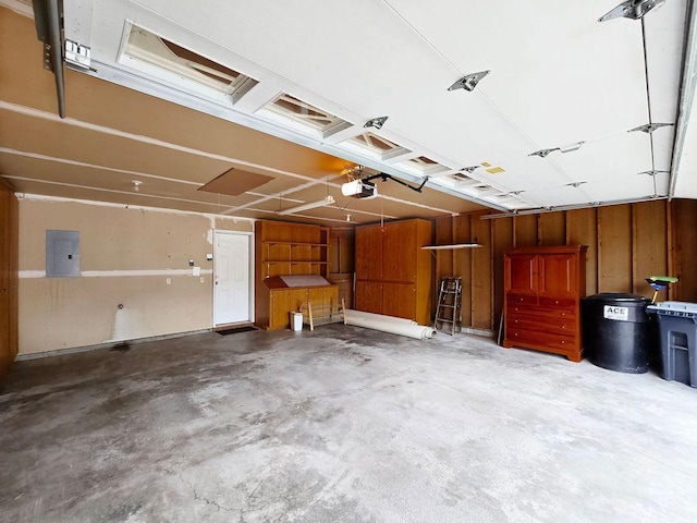 1207 Silverthorn Ct, Shoreview, MN 55126 - garage featuring electric panel and a garage door opener