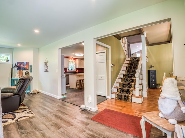 5936 Roosevelt Rd SE, Bemidji, MN 56601 - living room with stairway, wood finished floors, healthy amount of natural light, and recessed lighting