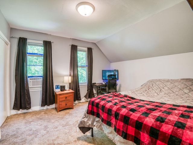 5936 Roosevelt Rd SE, Bemidji, MN 56601 - bedroom with light carpet, cooling unit, and vaulted ceiling