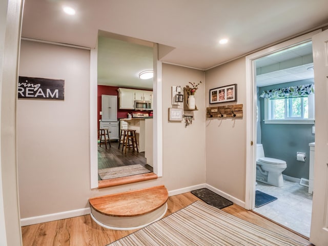 5936 Roosevelt Rd SE, Bemidji, MN 56601 - hallway featuring light wood finished floors and recessed lighting