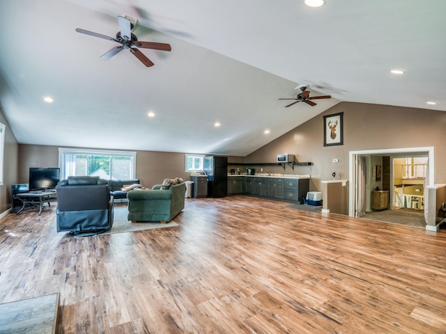 5936 Roosevelt Rd SE, Bemidji, MN 56601 - living room with ceiling fan, lofted ceiling, light wood-style flooring, and recessed lighting