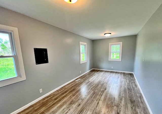 7165 US Highway 169, Garrison, MN 56450 - empty room featuring wood finished floors and baseboards