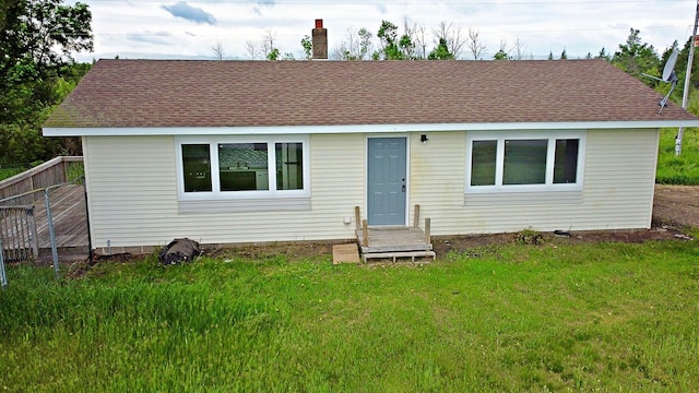 7165 US Highway 169, Garrison, MN 56450 - view of front facade with a front lawn and roof with shingles