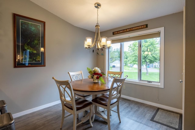 609 Main St E, Wabasha, MN 55981 - dining area featuring a chandelier and dark wood-style flooring