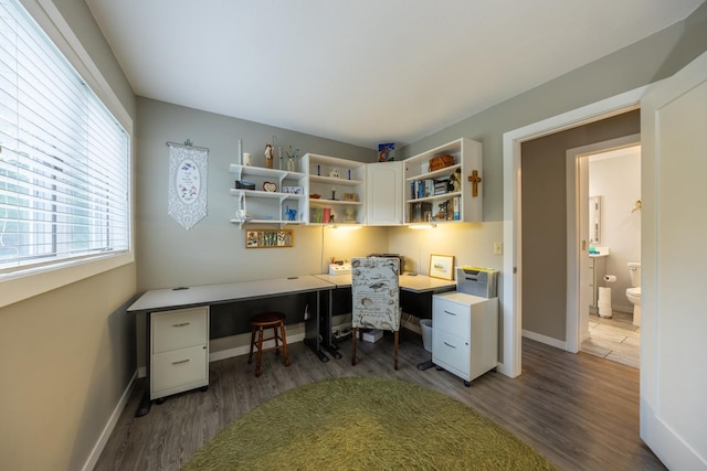 609 Main St E, Wabasha, MN 55981 - office area featuring wood finished floors and built in study area