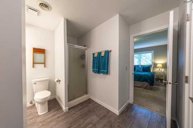 609 Main St E, Wabasha, MN 55981 - ensuite bathroom with wood finished floors and a shower stall