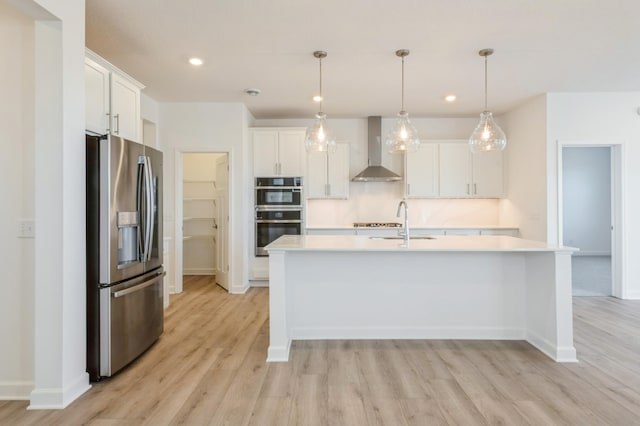 20264 Marsh Ct, Rogers, MN 55311 - kitchen with appliances with stainless steel finishes, wall chimney range hood, light wood-type flooring, light countertops, and recessed lighting