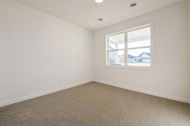 20264 Marsh Ct, Rogers, MN 55311 - carpeted spare room featuring baseboards