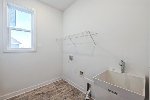 20264 Marsh Ct, Rogers, MN 55311 - laundry area with washer hookup and baseboards
