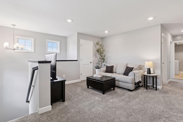 9462 Bridle Way, Victoria, MN 55386 - carpeted living room featuring a chandelier and recessed lighting