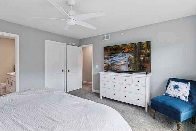 9462 Bridle Way, Victoria, MN 55386 - bedroom with light colored carpet, ceiling fan, and ensuite bathroom