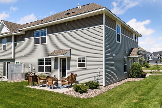9462 Bridle Way, Victoria, MN 55386 - rear view of property featuring a patio and a shingled roof