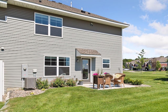 9462 Bridle Way, Victoria, MN 55386 - back of property with a lawn and a patio