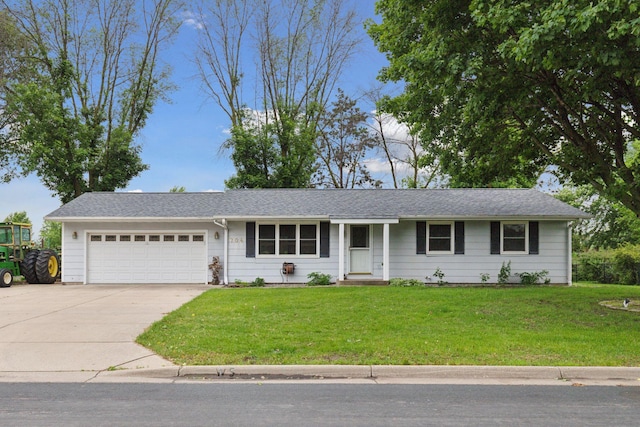 704 Highland Dr, New Prague, MN 56071 - ranch-style house with an attached garage, a front yard, and concrete driveway