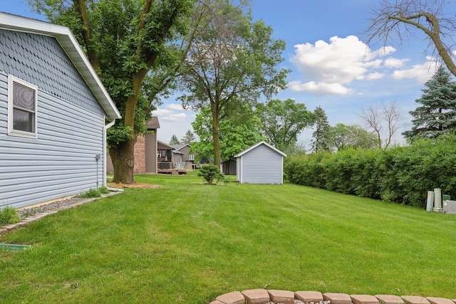 704 Highland Dr, New Prague, MN 56071 - view of green lawn with a shed