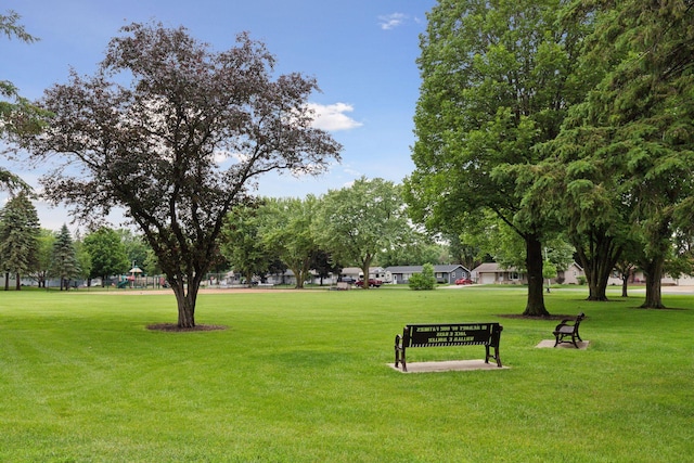 704 Highland Dr, New Prague, MN 56071 - view of home's community featuring a yard