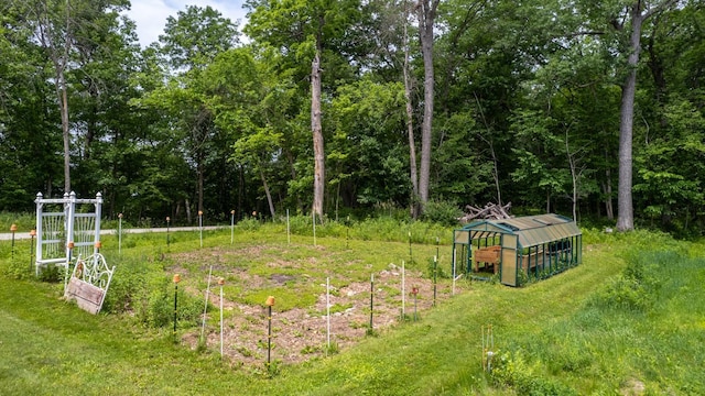 31340 Indigo Rd, Fountain, MN 55935 - view of yard featuring a garden and an outdoor structure