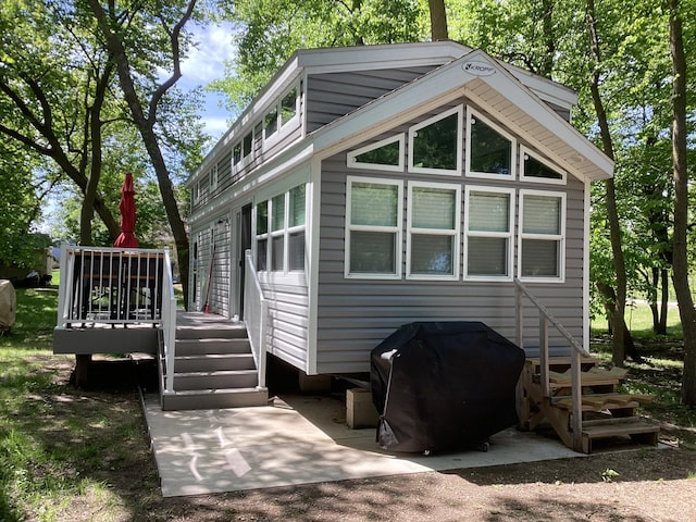 14275 Schuelke Beach Rd NW, Miltona, MN 56354 - rear view of house with a deck