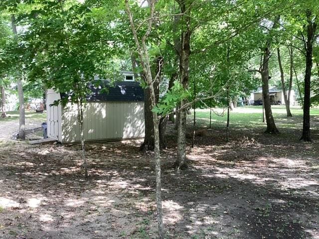 14275 Schuelke Beach Rd NW, Miltona, MN 56354 - view of yard with a storage shed