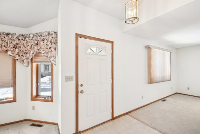 2513 Sumac Rdg, White Bear Lake, MN 55110 - entrance foyer featuring healthy amount of natural light and light colored carpet