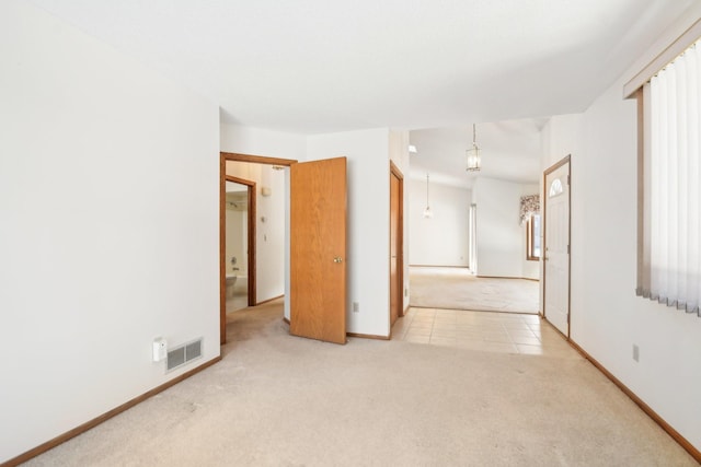 2513 Sumac Rdg, White Bear Lake, MN 55110 - carpeted empty room featuring baseboards and tile patterned floors