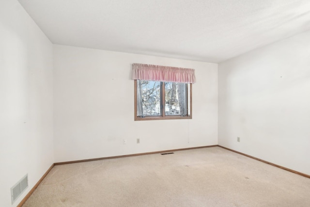 2513 Sumac Rdg, White Bear Lake, MN 55110 - spare room with carpet and baseboards