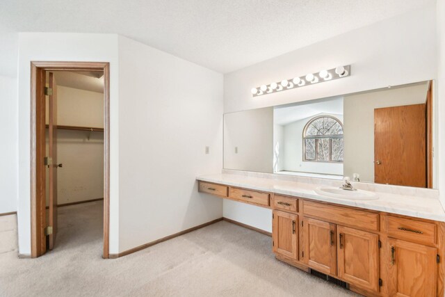 2513 Sumac Rdg, White Bear Lake, MN 55110 - bathroom with vanity and baseboards