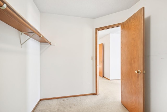 2513 Sumac Rdg, White Bear Lake, MN 55110 - walk in closet featuring light carpet