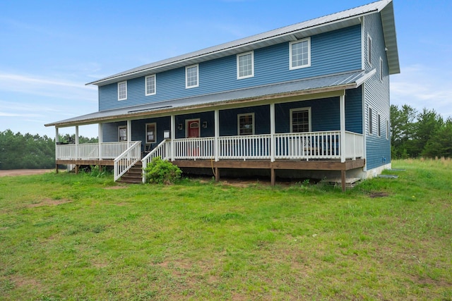 42118 Lowden Ave, Sunrise Twp, MN 55032 - view of front facade with a porch, a front lawn, and a metal roof